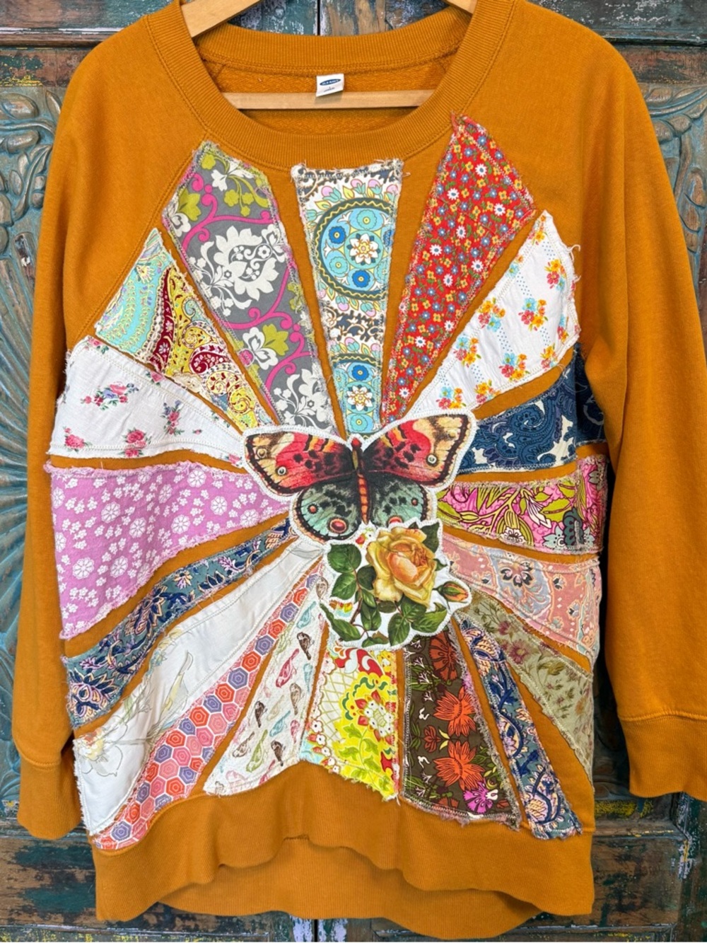 Maximalist handmade patchwork applique rayburst sweater